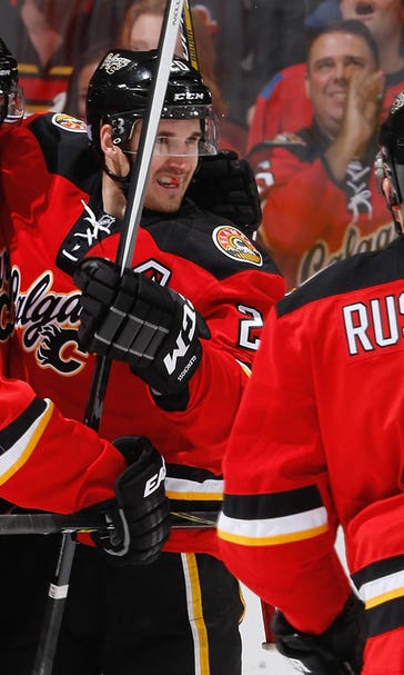 Three-goal third period propels Flames past Predators
